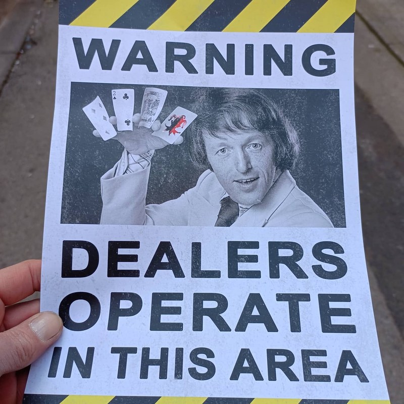 Dealers sign at the Willy Banjo stall at Knebworth 1996