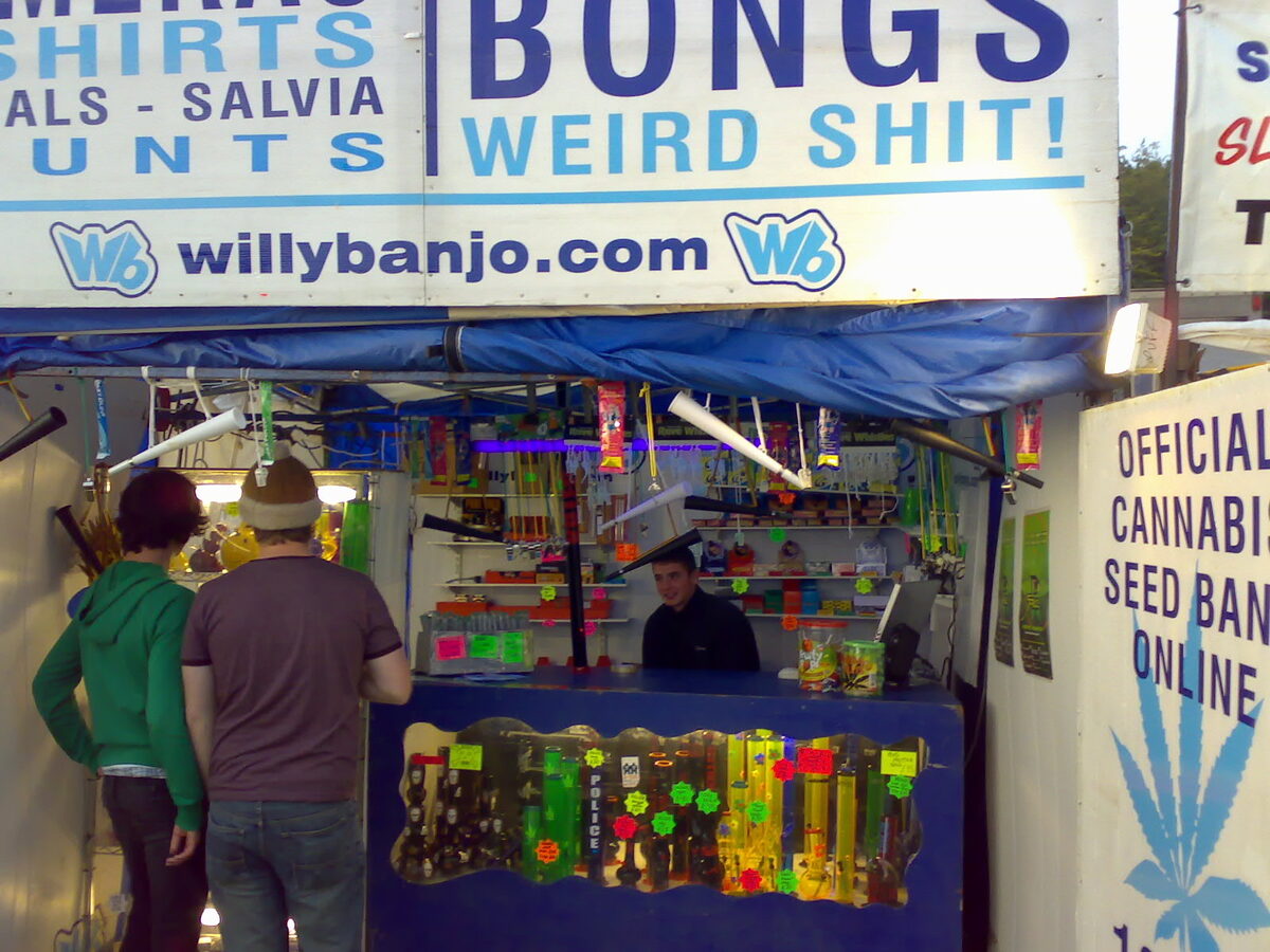 Bongs on display at the Willy Banjo stall at night