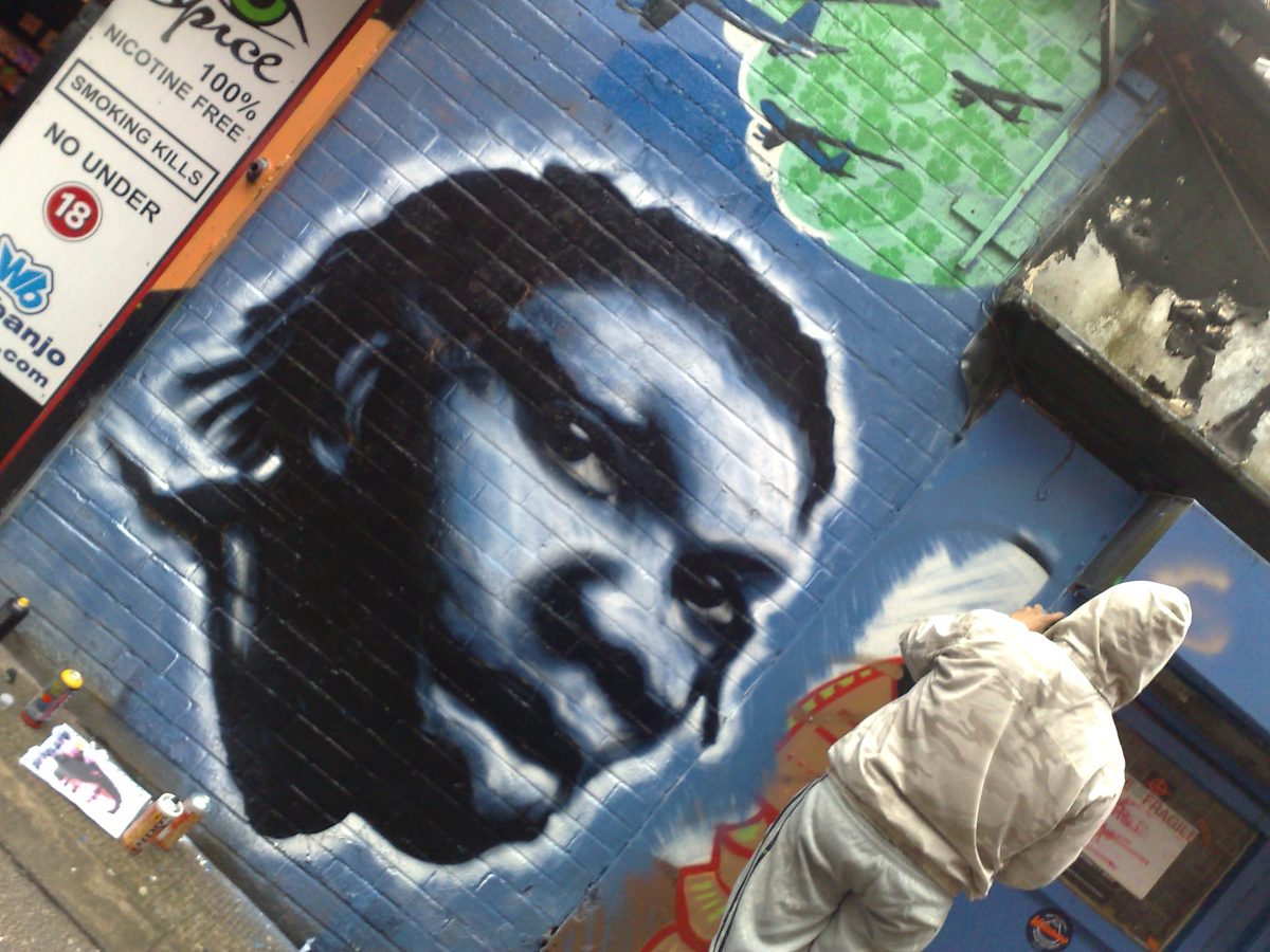 Black and white portrait graffiti on the Willy Banjo wall, 2008